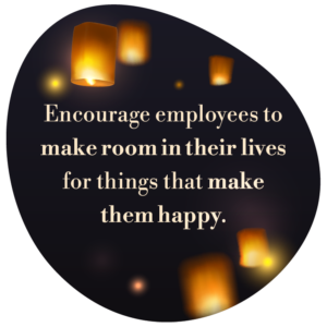 Roundel with lights and the wording 'Encourage employees to make room in their lives for things that make them happy.'